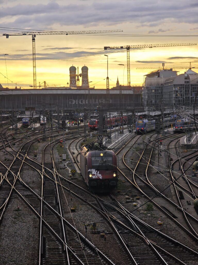 Hackerbrücke Munich at sunrise – with the towers of the Frauenkirche